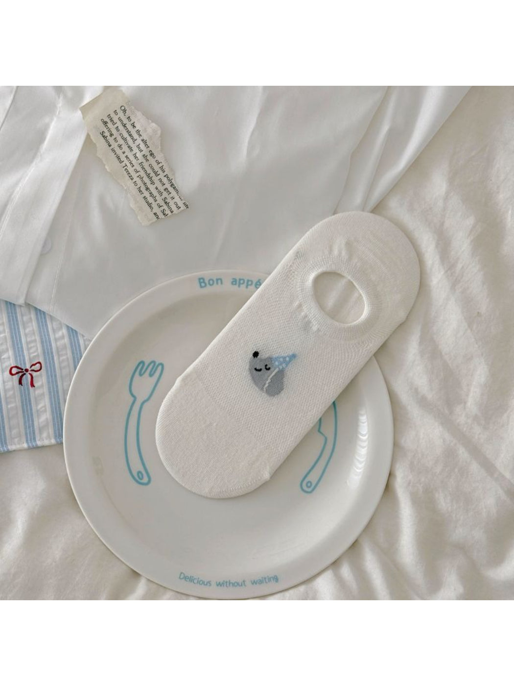 Rufia invisible socks packaging featuring puppy print branding and product details