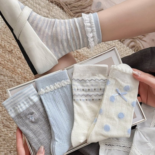 Pair of Rufia blue tone everyday crew socks displayed flat