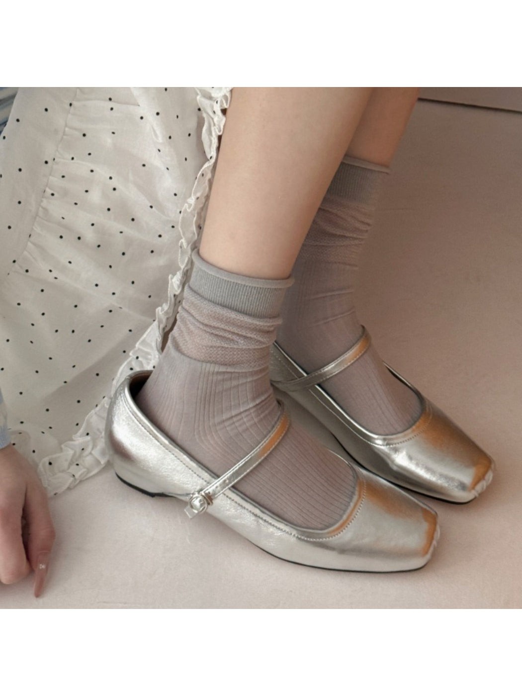 Pair of Rufia soft knit everyday crew socks in light gray displayed flat