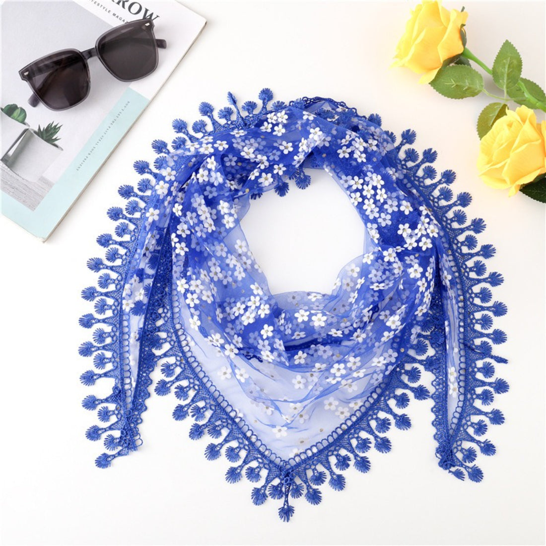 Flat lay of Haila Daisy Lace Triangle Veil Scarf showing triangular shape and intricate lace