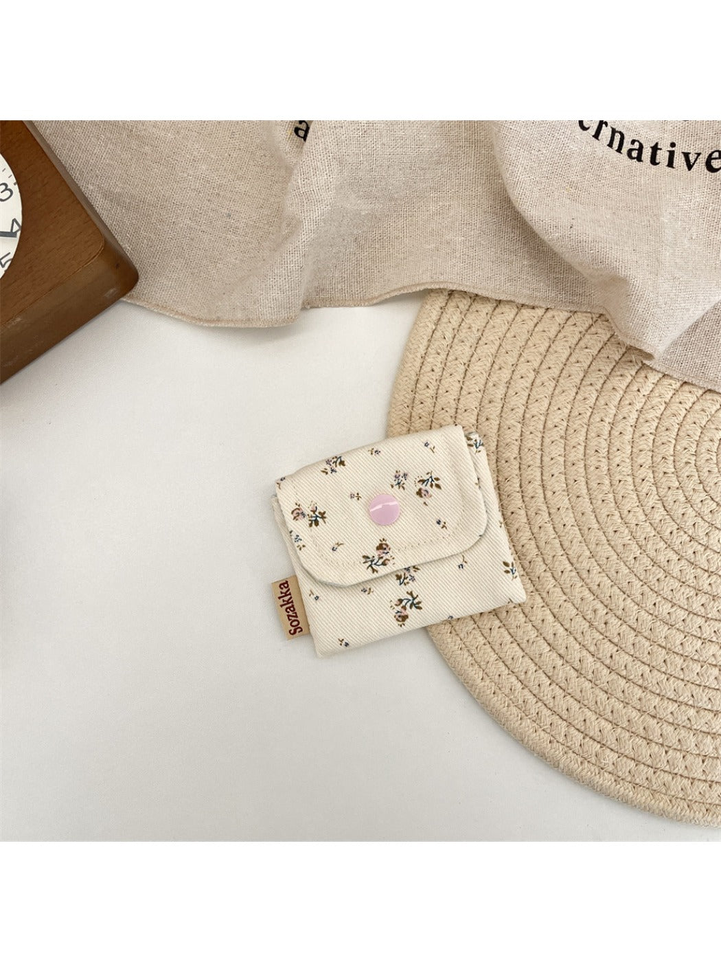 Cosbai Floral Print Coin Pouch laying on white surface highlighting floral print