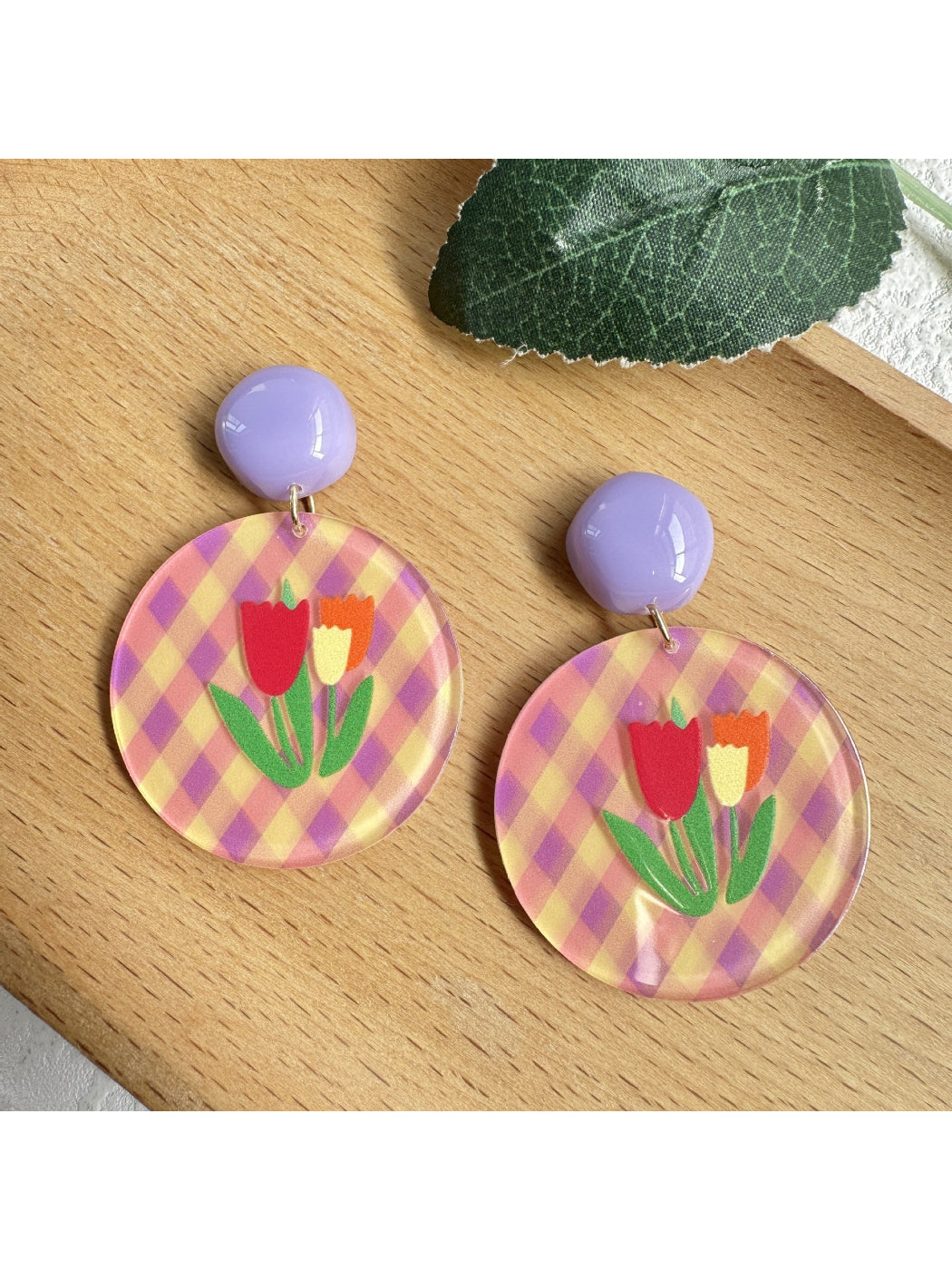 Close-up of Earwish Tulip Gingham Drop Earrings showing fabric texture and gold hooks