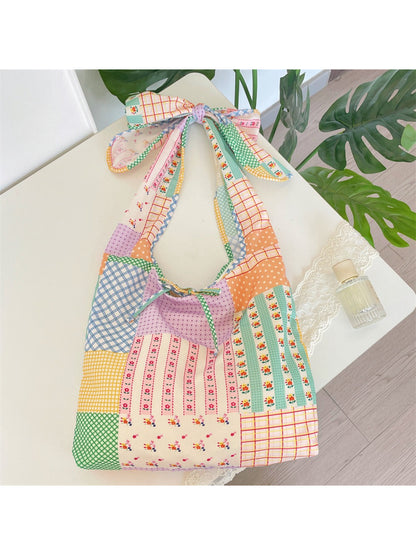 Cosbai Floral Patchwork Knot Strap Bag front view with colorful floral fabric and knotted strap