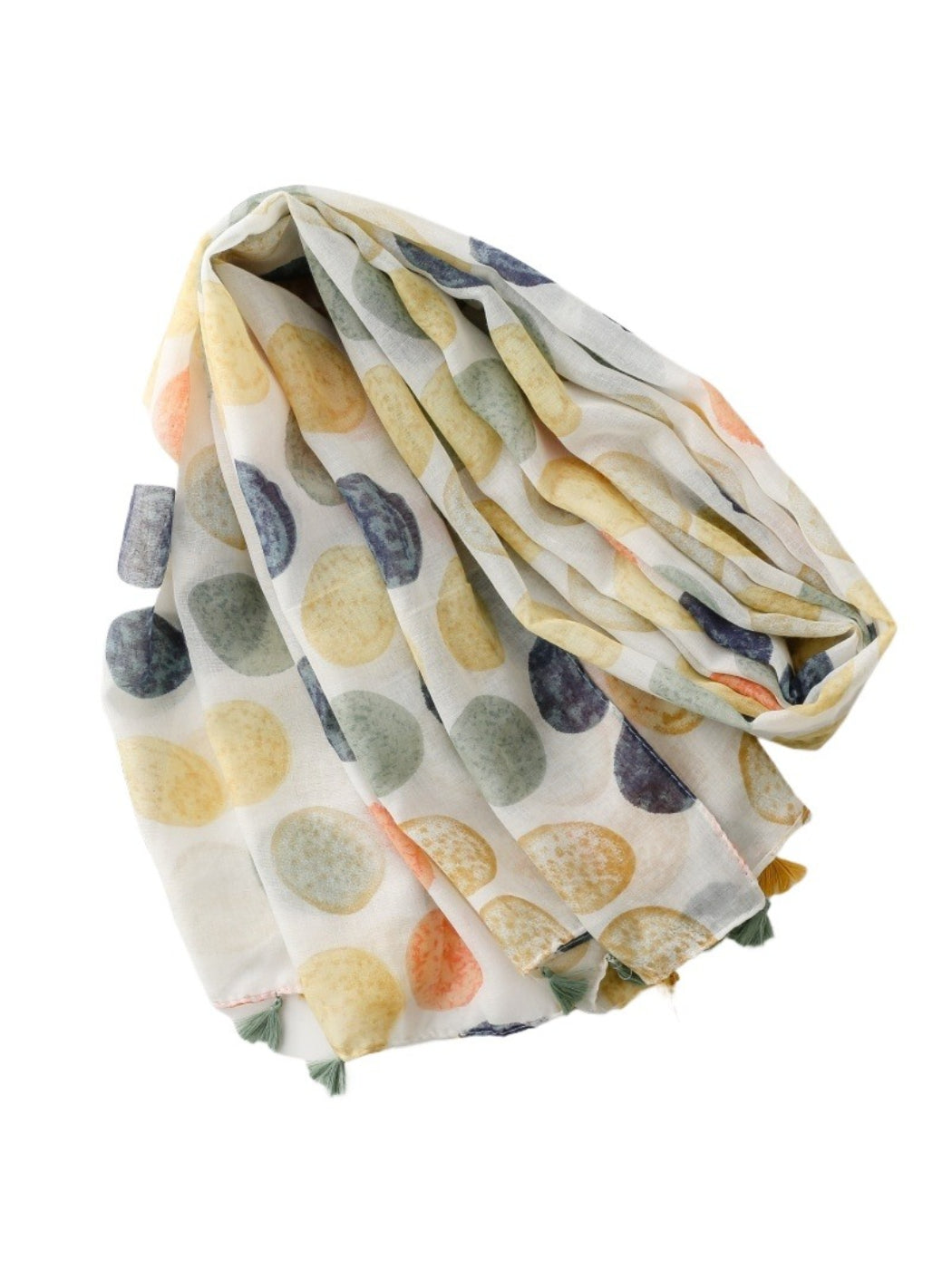Close-up of Scarvii scarf fabric with watercolor dot design and detailed tassels