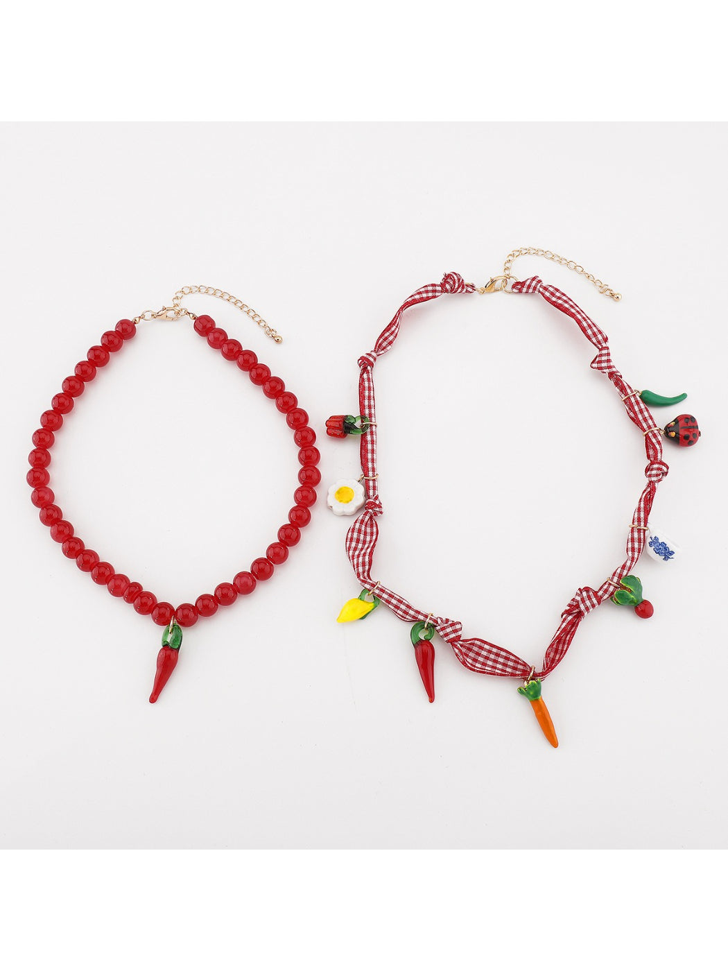 Neckit Playful Food Charm Necklace displayed on a white background highlighting charm details