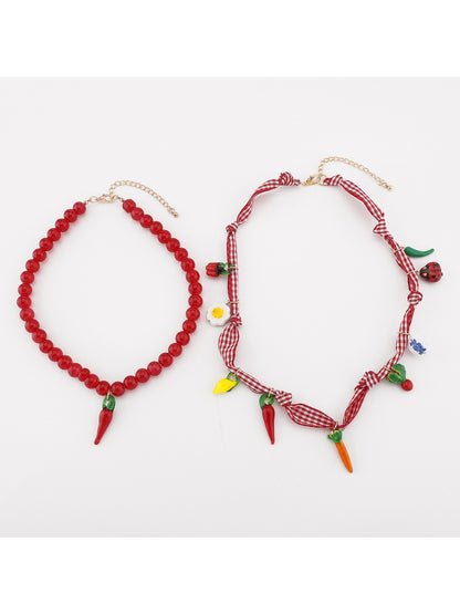 Neckit Playful Food Charm Necklace displayed on a white background highlighting charm details