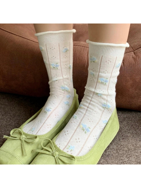 WHTFLW Rufia crew socks with white ditsy floral pattern