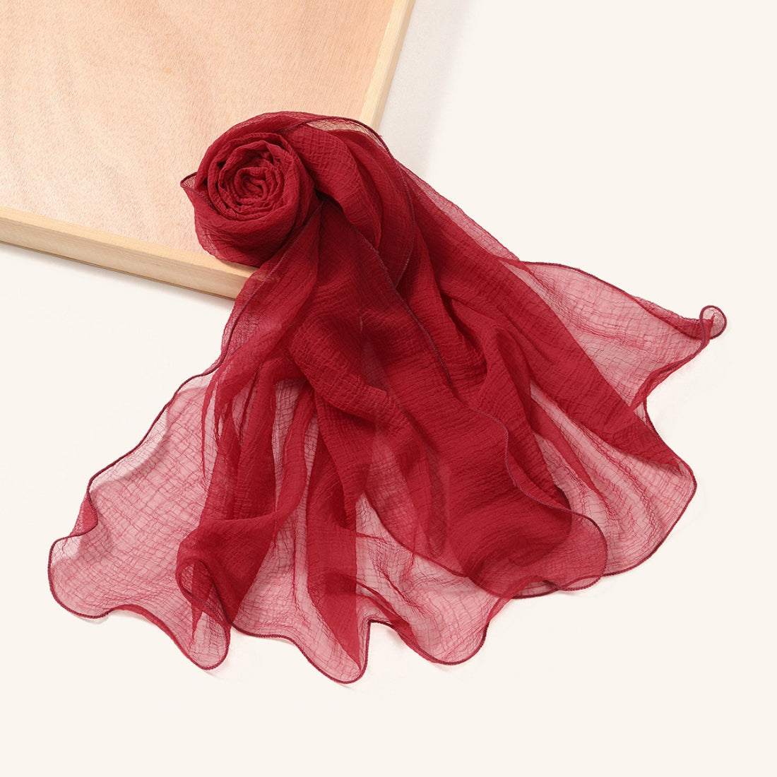 Scarvii shawl scarf wrapped around neck showing textured fabric and waves
