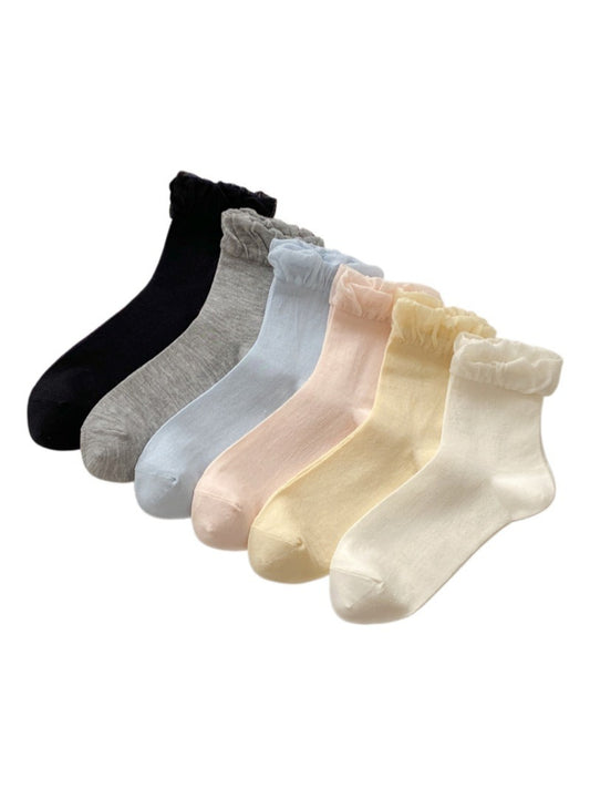 Pair of Rufia soft crew socks with delicate frill trim in pastel pink