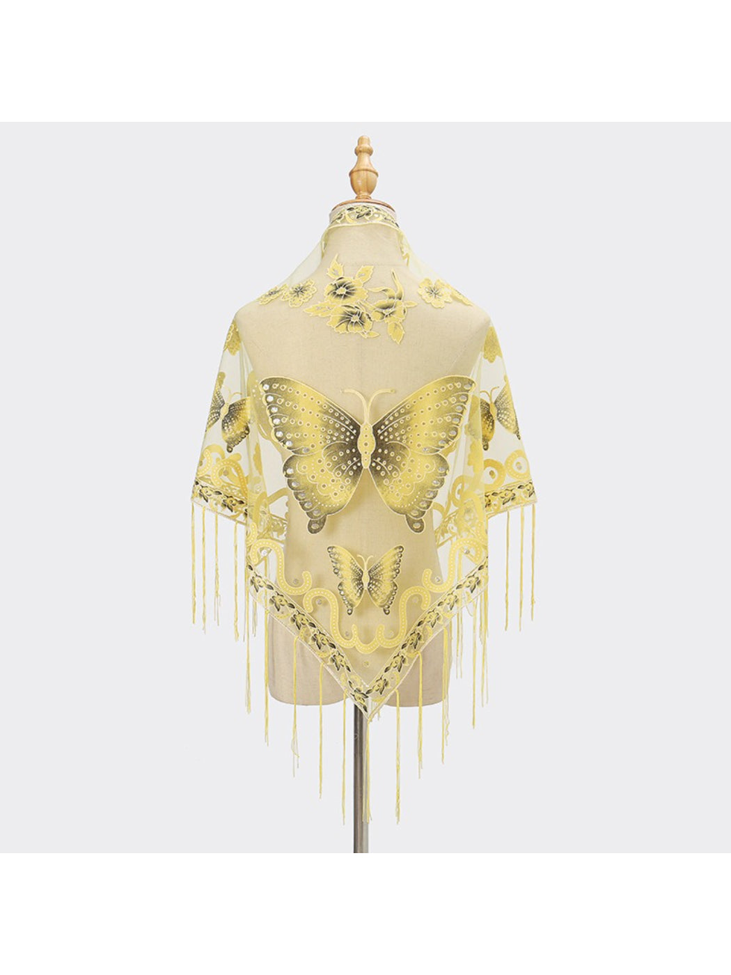 Model posing with Scarvii Butterfly Fringe Triangle Scarf tied around neck showing fringe detail
