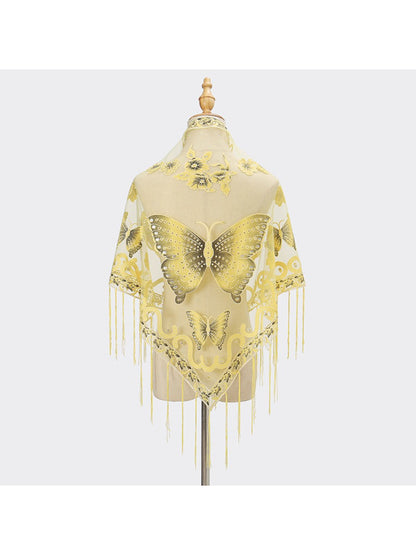 Model posing with Scarvii Butterfly Fringe Triangle Scarf tied around neck showing fringe detail