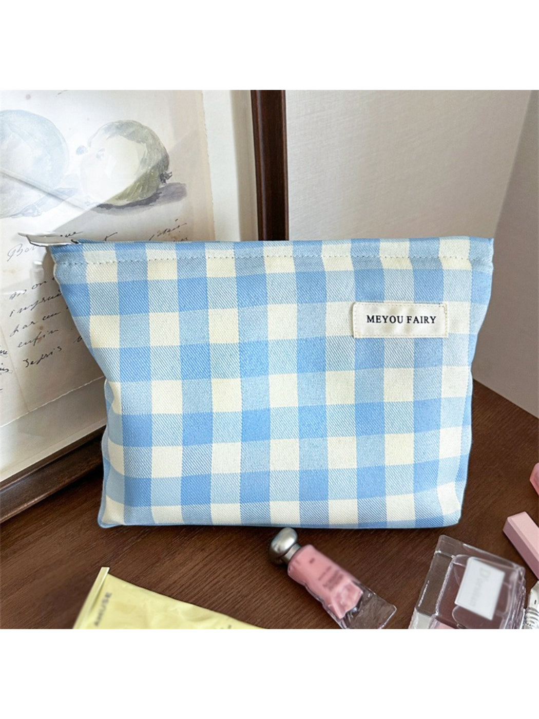 Close-up of Cosbai pastel check makeup pouch showing fabric texture