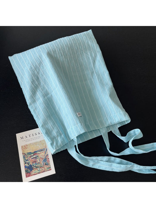 Cosbai sky blue textured tote bag with double handles on white background