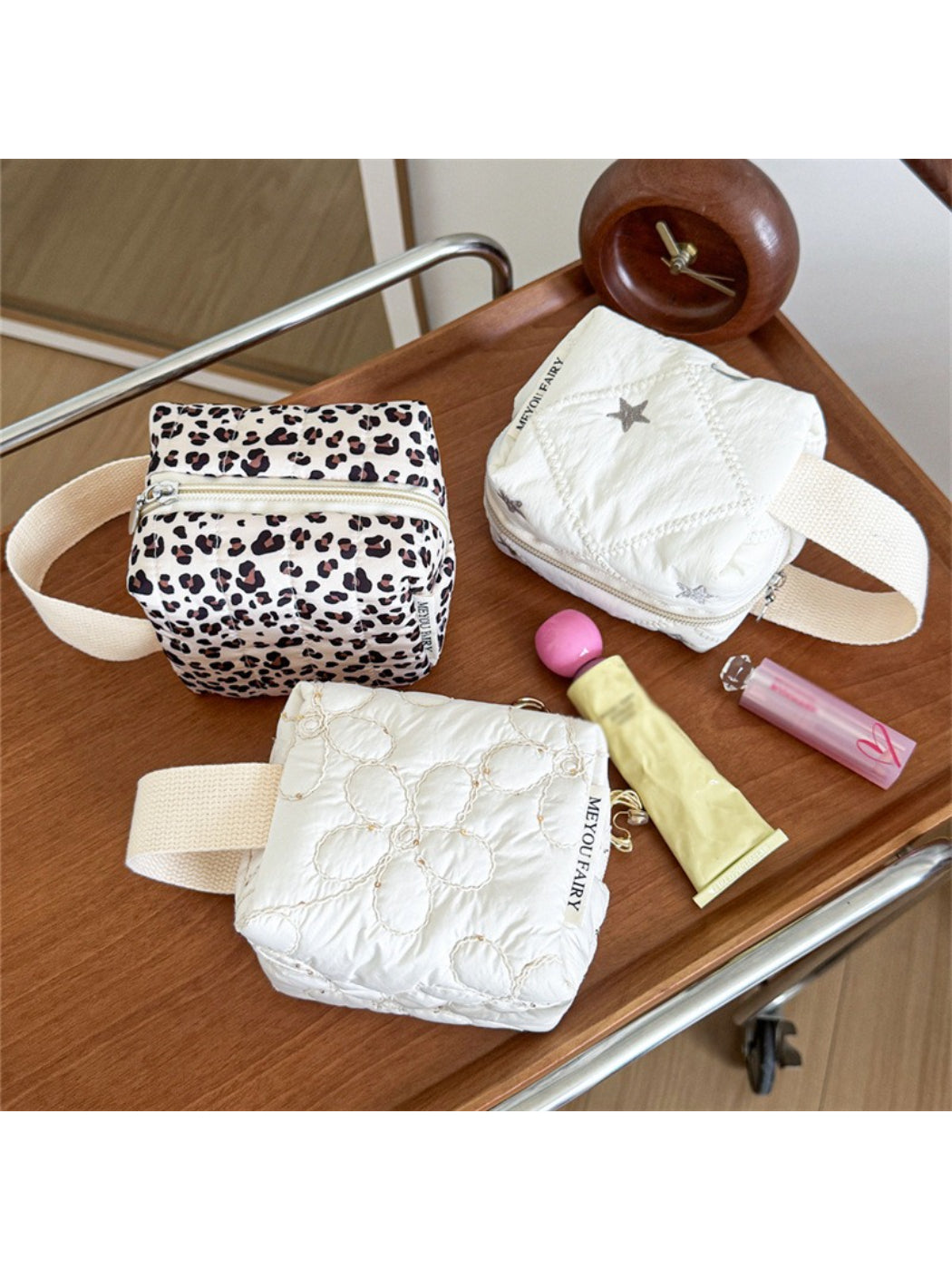 Cosbai soft handle cosmetic bag in a neutral color on a white background