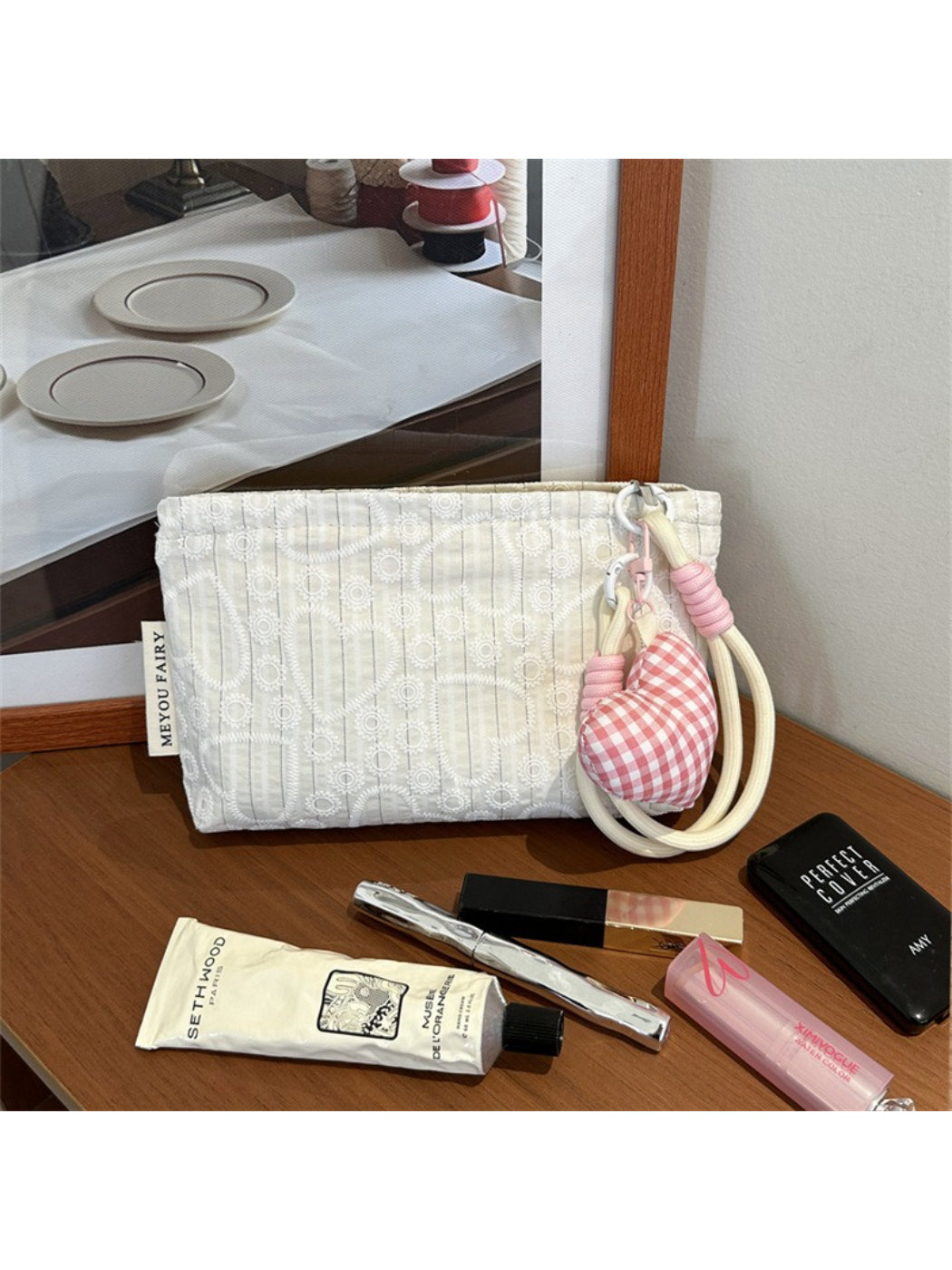 Cosbai pouch folded flat with heart pattern visible on both sides