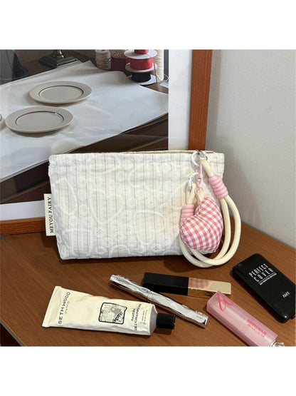 Cosbai pouch folded flat with heart pattern visible on both sides