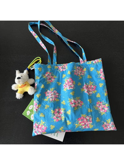 Interior view of Cosbai Painterly Bloom Shoulder Tote showing spacious