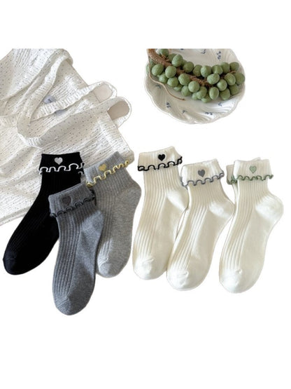 Rufia Sweet Heart Edge Ribbed Socks displayed flat showing full length and scalloped cuff