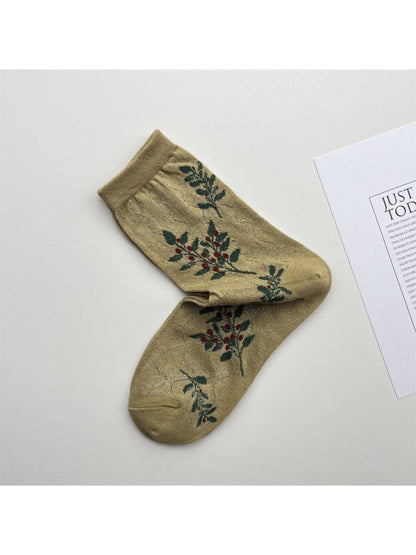 Close-up of Rufia floral blue crew socks