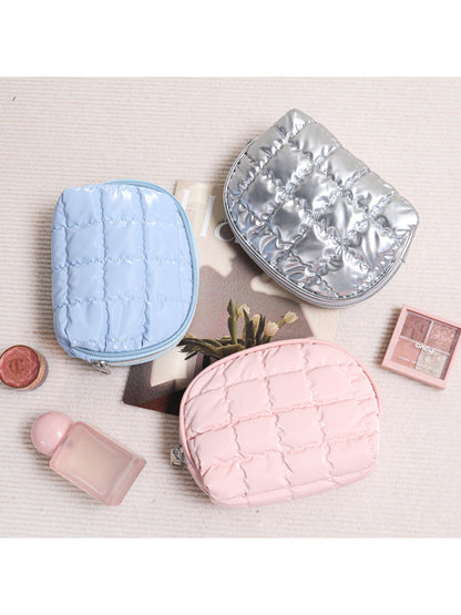 Cosbai Quilted Half Moon Cosmetic Case in light color with visible quilting pattern