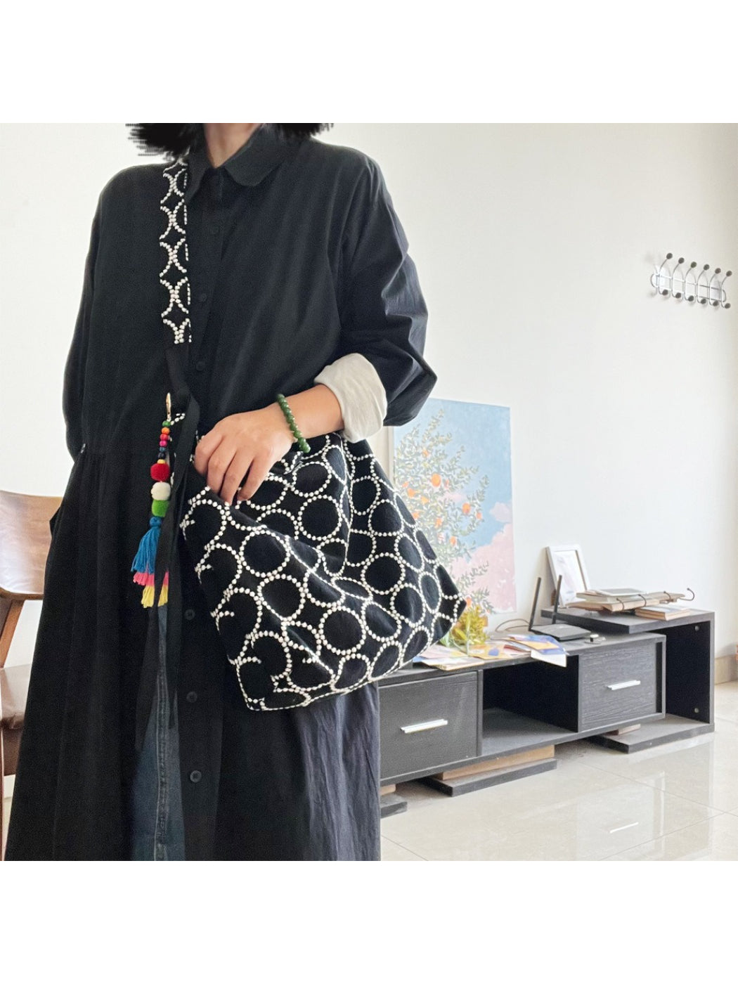 Side view of Cosbai shoulder tote highlighting spacious interior and sturdy handles