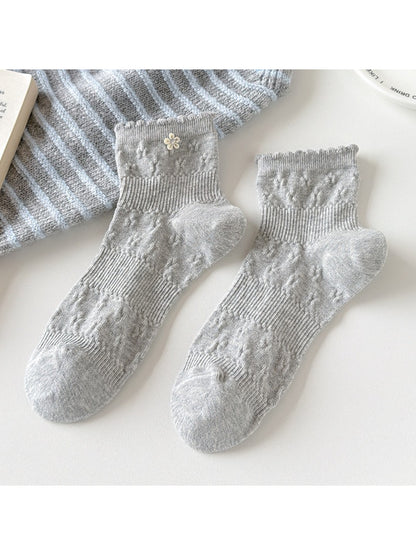 Detail of soft knit texture on Rufia Sweet Floral Crew Socks