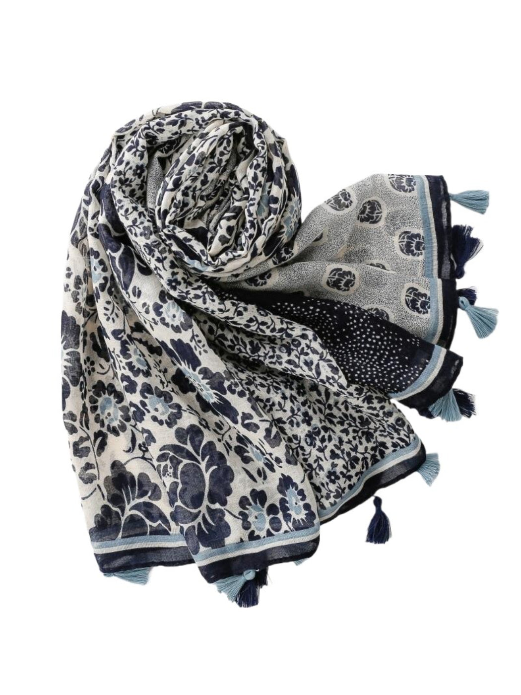 Scarvii boho wrap scarf styled as a head wrap on a mannequin with neutral background