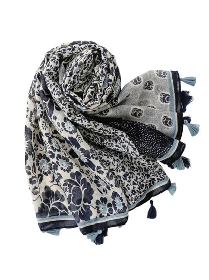Scarvii boho wrap scarf styled as a head wrap on a mannequin with neutral background