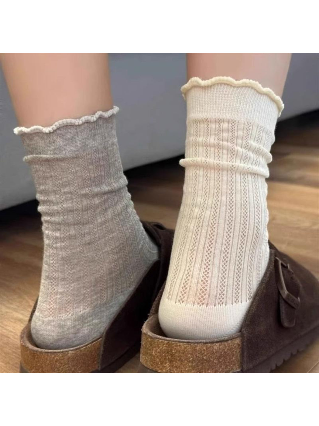 Pair of Rufia soft ribbed crew socks with ruffle trim in light beige