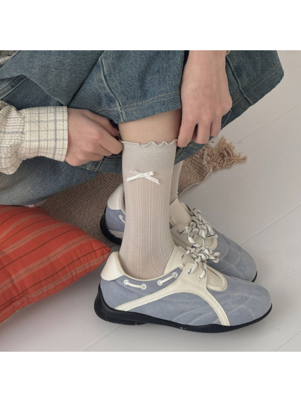 Rufia socks displayed flat highlighting the bow and frill design on the cuff