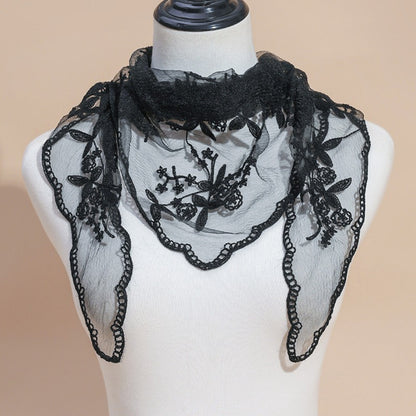Close-up of Haila lace veil head scarf showing intricate embroidery details