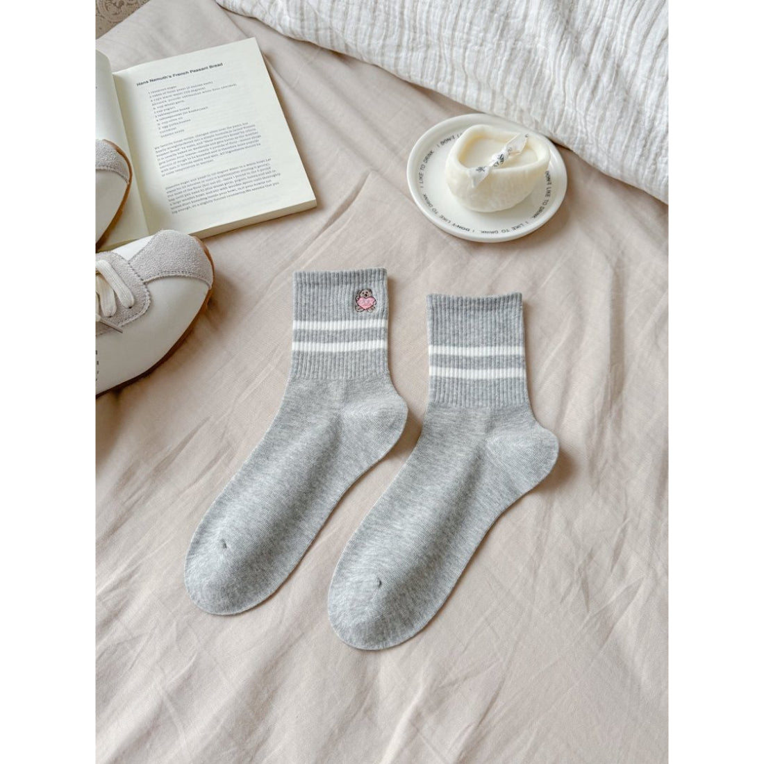 Side view of Rufia Mini Motif Stripe Crew Socks highlighting stripe details