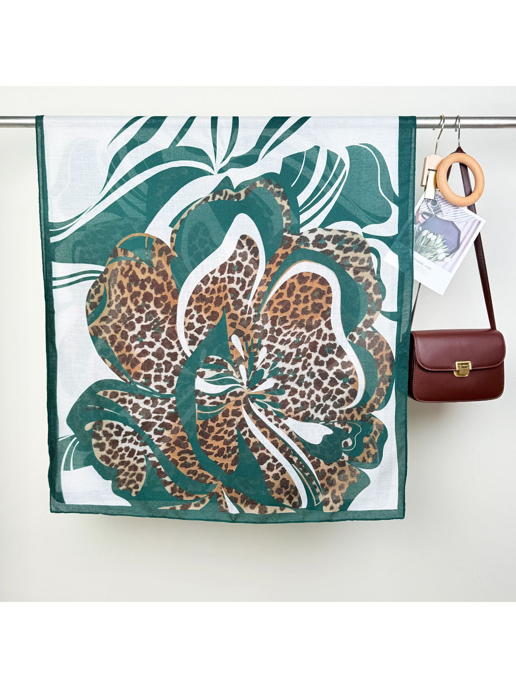Scarvii scarf laid flat displaying full leopard and floral design