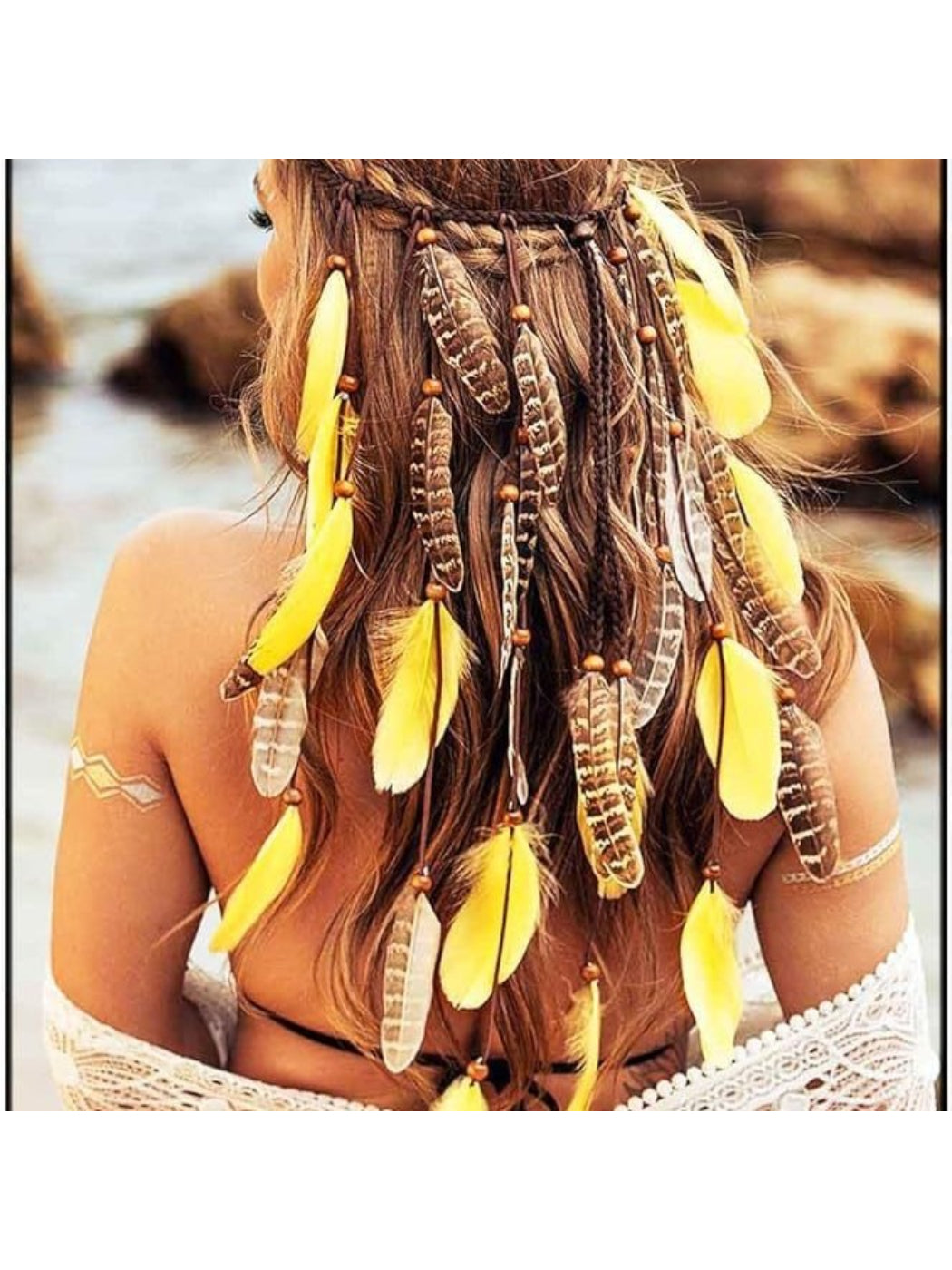 Side view of flowing feather hair headpiece designed for festival wear