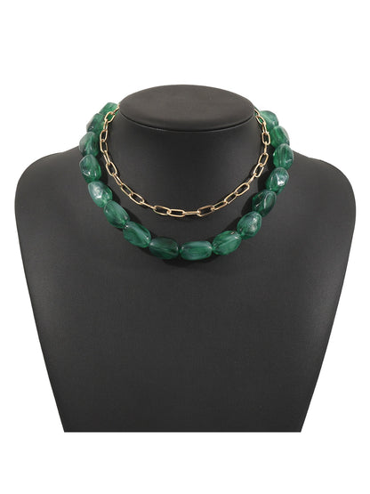 Side angle of Neckit color beaded chain necklace showing bead texture