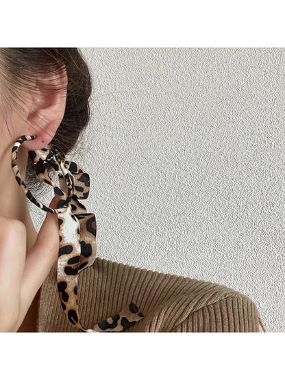 Pair of Leopard Ribbon Hoop Earrings displayed on a white background highlighting the design