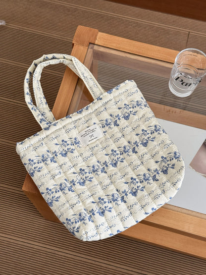 Cosbai pastel garden pattern tote bag folded flat on a white surface