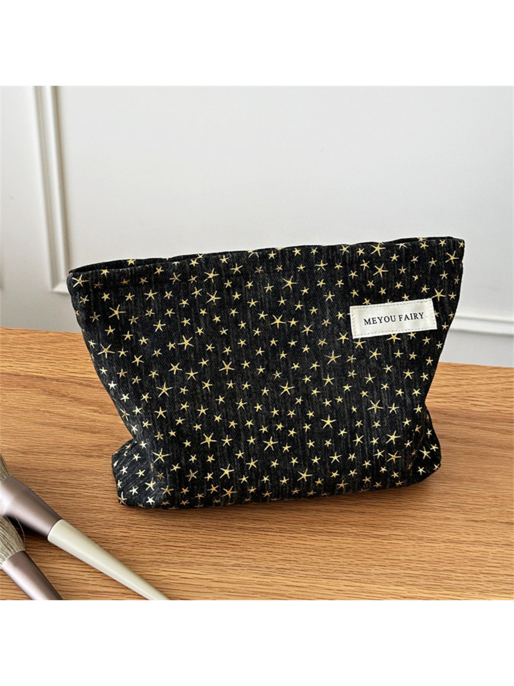 Cosbai Black Star Cosmetic Bag angled side view showing shape and star pattern