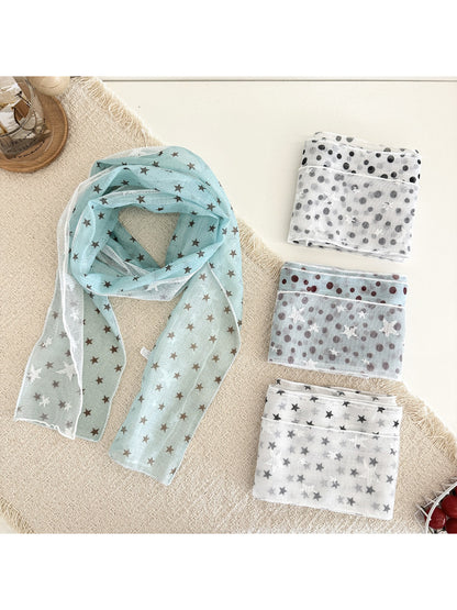 Scarvii sheer scarf with white star print on black fabric displayed flat