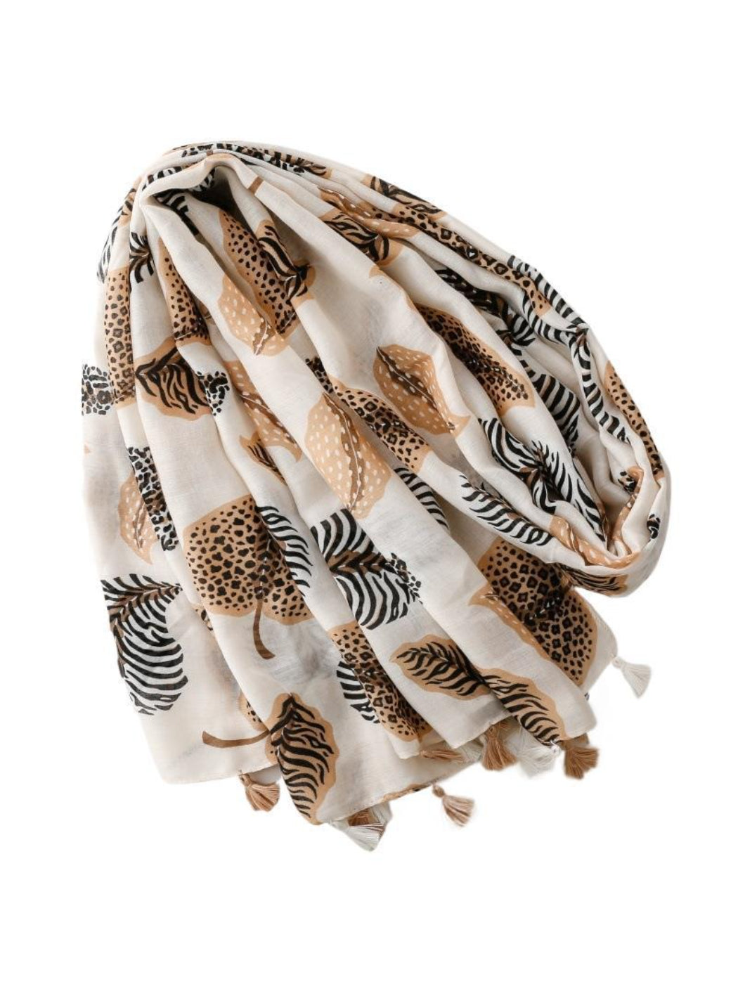 Scarvii Jungle Leaf Fringe Scarf draped over a chair showing full pattern and fringe detail