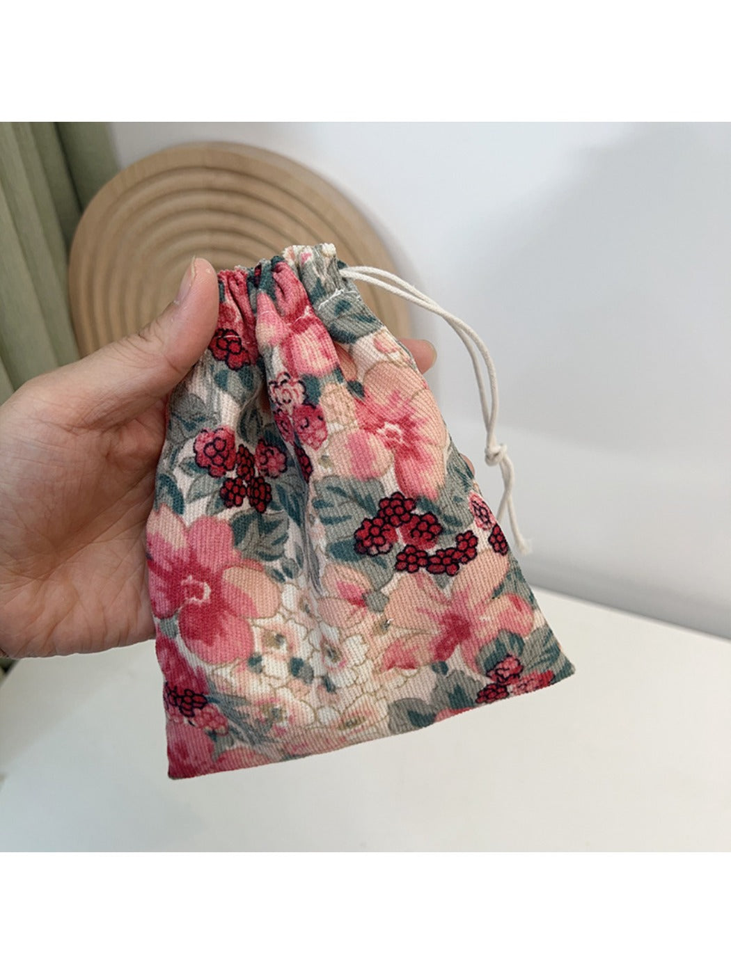 Cosbai floral drawstring pouch with pink and green floral print in compact size