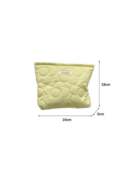 Cosbai Quilted Daisy Cosmetic Pouch held in hand to show size and portability