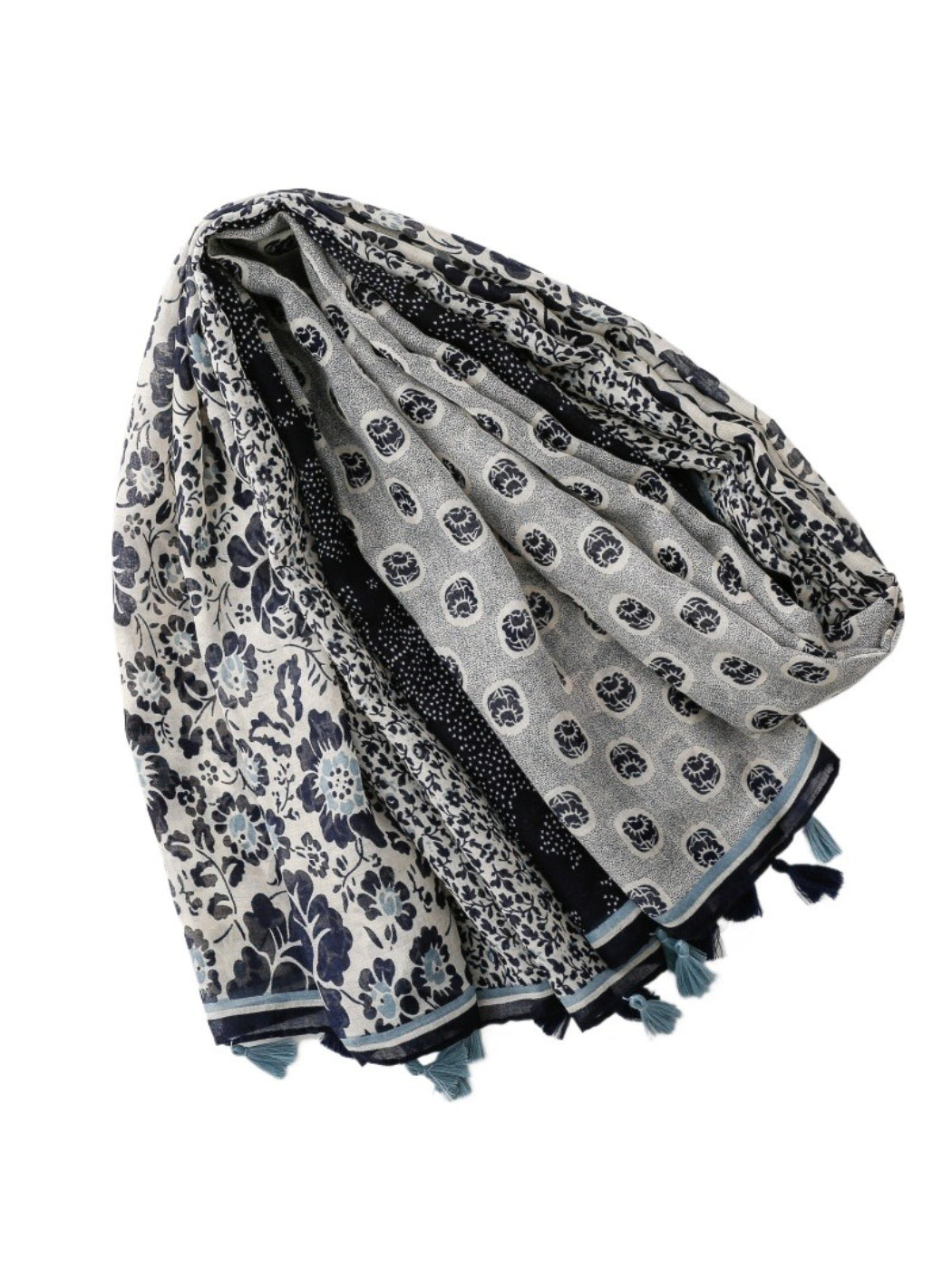 Model wearing the Scarvii boho patchwork wrap scarf draped over shoulders with casual outfit