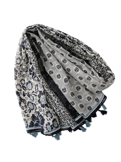 Model wearing the Scarvii boho patchwork wrap scarf draped over shoulders with casual outfit