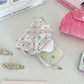Cosbai Soft Dot Button Coin Purse in soft pink open to display interior