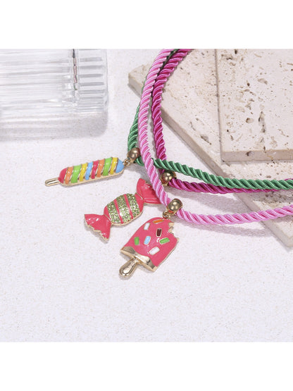 Neckit color rope necklace displayed flat showing candy-shaped charms along the rope