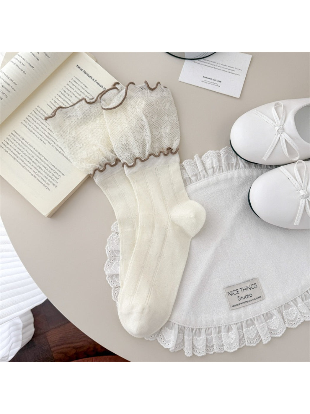 Rufia crew socks showing lace detail and scalloped edge