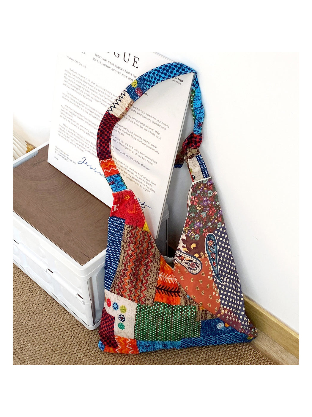 Side view of Cosbai boho patchwork shoulder bag showing strap and fabric details