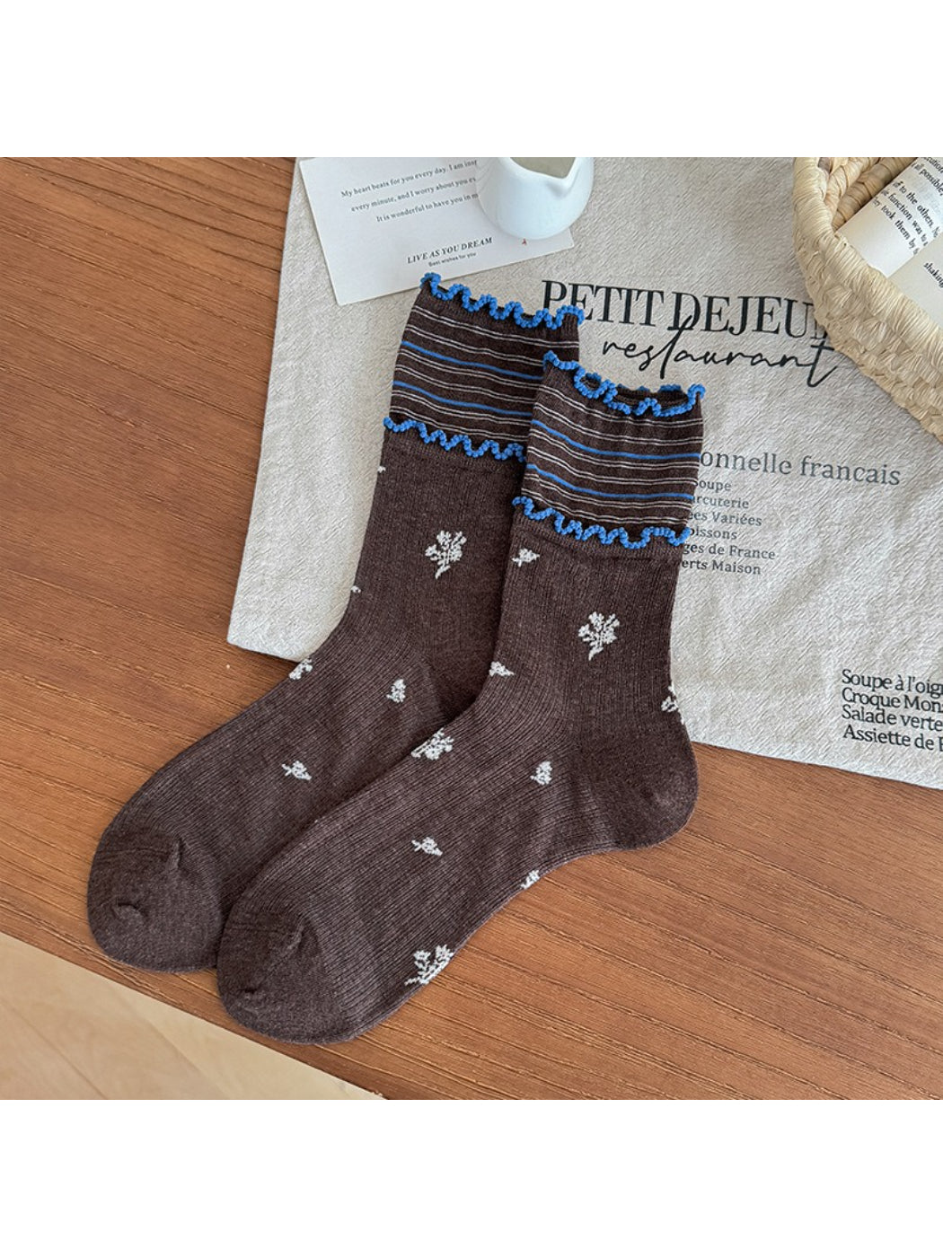 Rufia floral crew socks folded to show pattern and frill edge detail