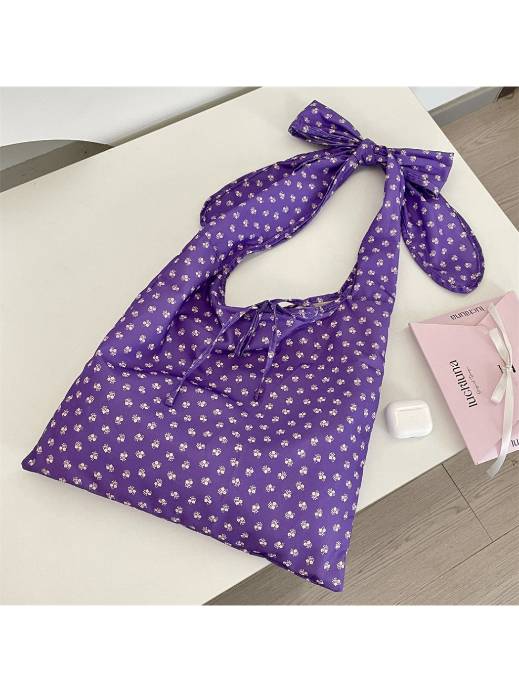 Cosbai floral shoulder bag open to reveal interior lining and pocket